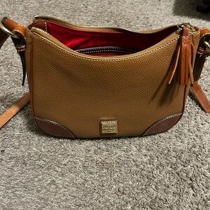Gently used Dooney and Bourke Carmel crossbody.